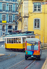 Historical Tram With Tourists, Circulating Through The Streets of Lisbon. Portugal, Europe