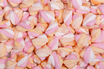 background of pink and orange marshmallows