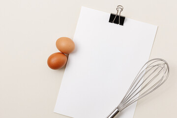 Cooking baking blank recipe flat layout with notebook eggs and whisk