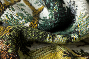 Close up view of antique piece of handmade carpet, textile detail
