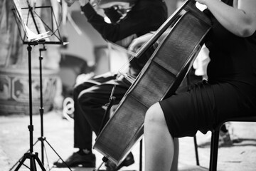 musician playing cello
