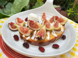Fig with mulberry toast and greek yogurt