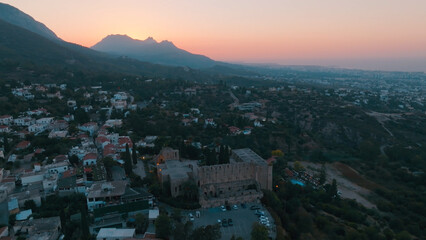 Bellapais Monastery aerial sunset view in Bellapais village, North Cyprus