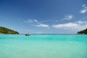 Fototapeta na wymiar Vacation in paradise. Travel by Thailand. Beautiful landscape tropical beach with turquoise water.