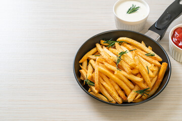 French fries with sour cream and ketchup