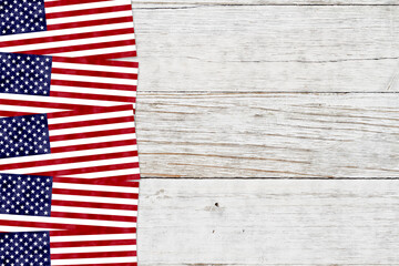 Obraz premium Red, white, and blue USA flag border on weathered wood