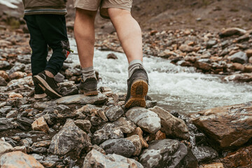 Fototapeta premium Father and son walking in the mountains 