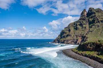 The rugged coastline of Punta del Hidalgo, with the Anaga Mountains in the background, Tenerife, Canary Islands