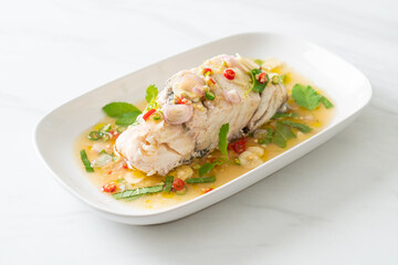 steamed sea bass fish with herbs