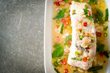 steamed sea bass fish with herbs