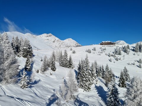 Fantastic evening winter landscape. Awesome Beautiful Mountain tourism vacation. Panoramic view of ski slope and amazing Italian Alps mountains in beautiful winter snow, Vals, Jochtal, Italy, Europe