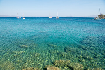 Crystal clear waters of the Mediterranean Sea in Datca resort town of Mugla, Turkey.
