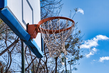 Naklejka premium Basketball basket in the city park