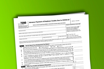 Naklejka premium Form 7200 documentation published IRS USA 05.18.2021. American tax document on colored