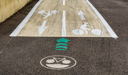 A two way, dedicated cycle way has created and is shown by clear directional usage signage - cyclist viewpoint