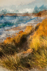Digital watercolour painting of Stunning landscape image of Sennen Cove in Cornwall during sunset viewed from grassy sand dunes with dramatic sky and long exposure sea motion