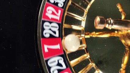 The roulette wheel in the casino is spinning - 7 red wins - Powered by Adobe