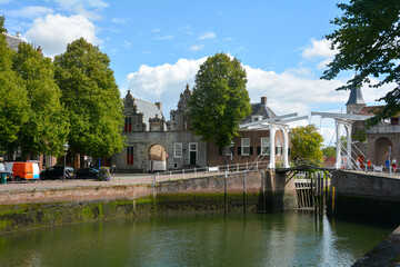 Fototapeta na wymiar Canal at the old harbor in the old town of Zierikzee, Netherlands