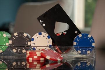 Ace of spades and poker chips in casino