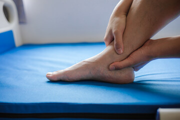 man with pain in foot