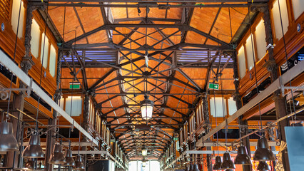 Obraz premium Roof of the Mercado de San Miguel, old building rehabilitated and modernized for the sale of food, Madrid.