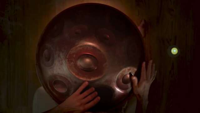 playing handpan - closeup