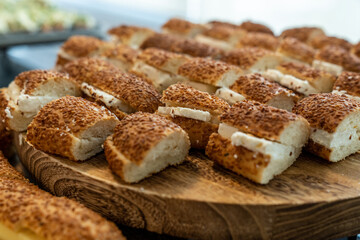 coffee break hotel during conference meeting, corporate revent with tea and coffee catering, decorated catering banquet table with variety of different pastry and bakery, with croissants and cookies
