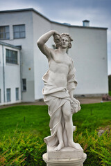 Statue of greek god bacchus in Alleya Statuy of Ermitazh-Vyborg, Vyborg, Russia