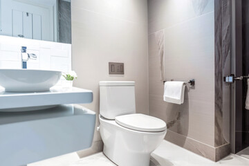 Clean toilet in bright modern bathroom, Generative AI