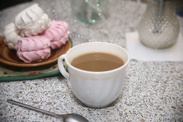 cup of coffee and cookies