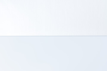 Fototapeta premium Blank sheet of paper split in half, isolated on white background with shadow and clipping path. Place for text.