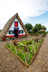 Fototapeta na wymiar Traditional triangular rural house at Madeira island, Portugal