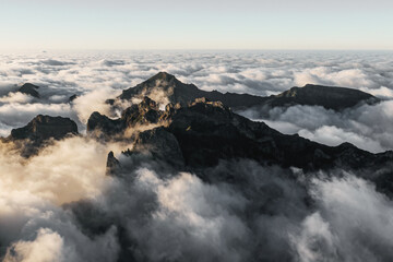 Mountain peaks above the clouds.