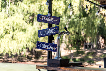 A sign of a bar offering drinks