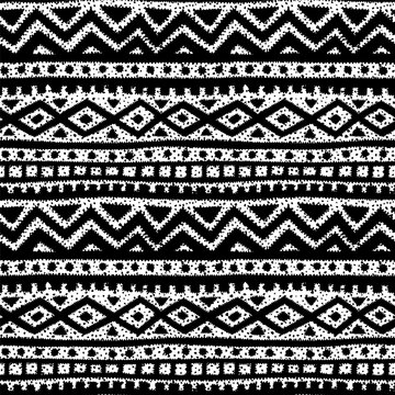 Seamless black and white abstract pattern. Ethnic and tribal motifs. Vector illustration.
