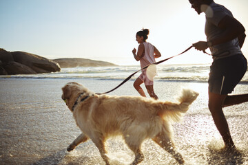 Dog, black couple and running beach fitness with an animal for morning exercise and runner workout....