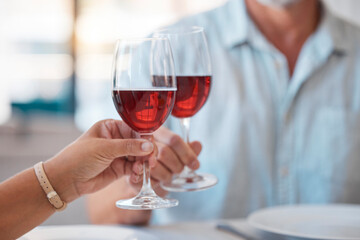 Hands, wine glasses and cheers for celebration dinner, date or table in thanks for fine dining at...