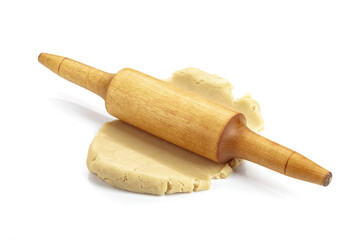 Dough and rolling pin isolated on white.