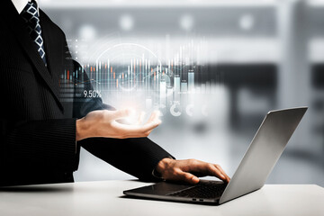 Businessman analyst working with digital finance business data graph showing technology of...