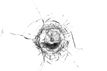 Broken glass from a bullet. Texture of broken glass.