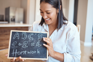 Learning, education and woman with homework blackboard for studying alphabet and numbers. Abc,...