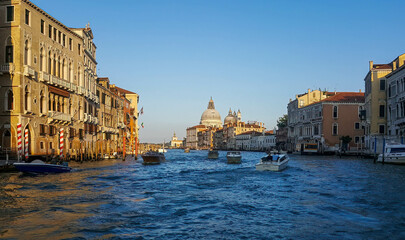 The panoramic and colorful view of canale grande in Venice during sunset.