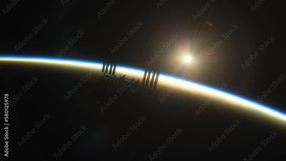 Wall mural international space station iss floating in orbit above planet earth in outer space. view from space