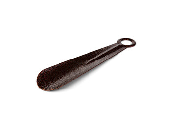 Metal shoehorn on a white background.