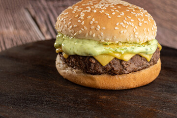 Hamburger - Snack with beef burger, green sauce, mozzarella cheese and fries