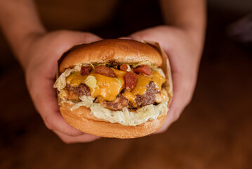 Burger - Sandwich with beef burger, bacon, cheddar cheese and salad