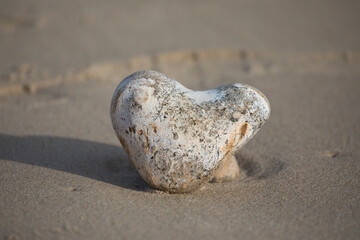 Fototapeta na wymiar Heart shaped stone at Hosey Gap, Norfolk