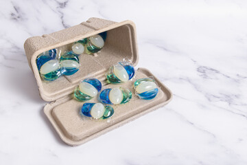 Gel for washing in capsules. Laundry detergent in biodegradable packaging