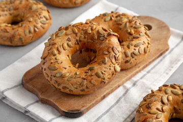 Homemade Pumpkin Seed Bagels Ready to Eat, side view.