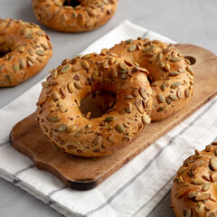 Homemade Pumpkin Seed Bagels Ready to Eat, side view.
